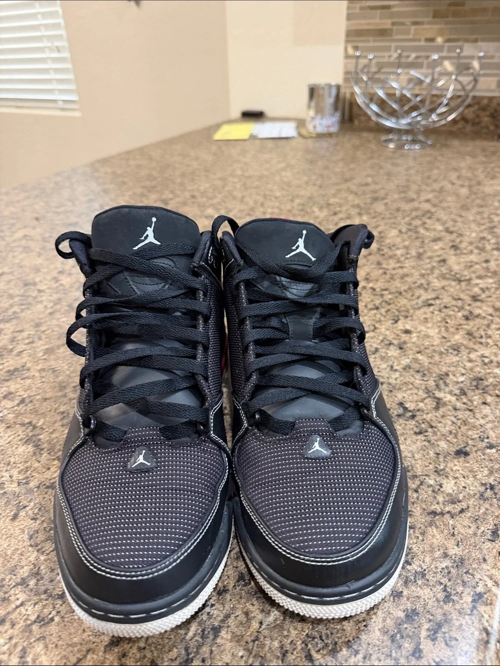 Jordan As-You-Go Men’s Black with Red Accents Mid-Top Sneakers